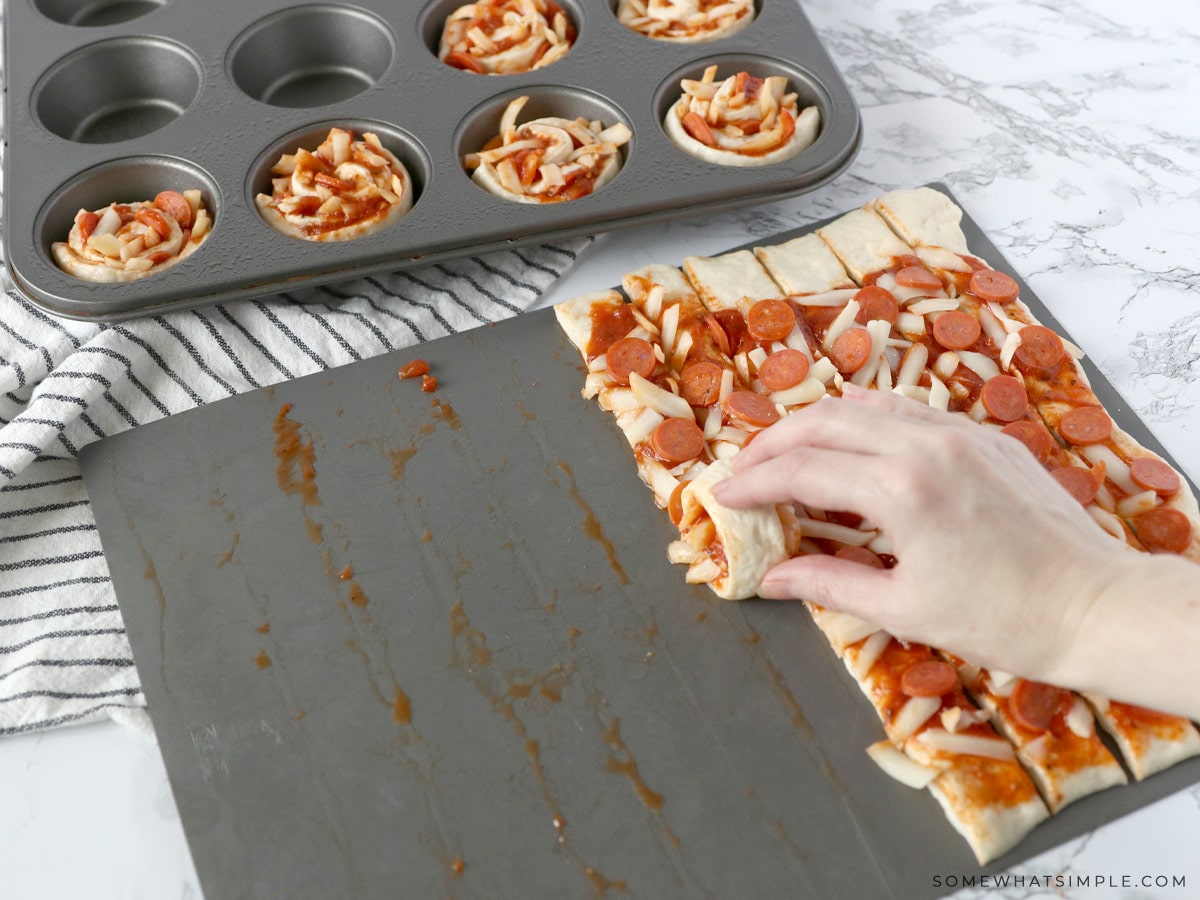 rolling up pizza cupcakes