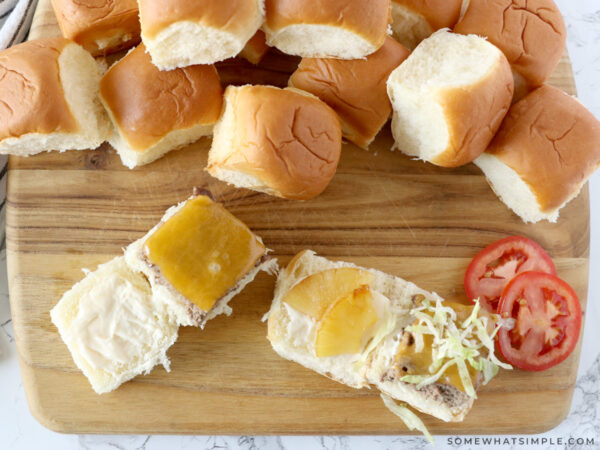 adding ingredients to hawaiian rolls