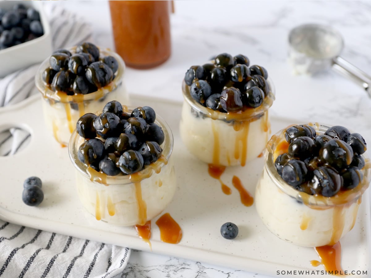 rice pudding parfaits on a small serving board