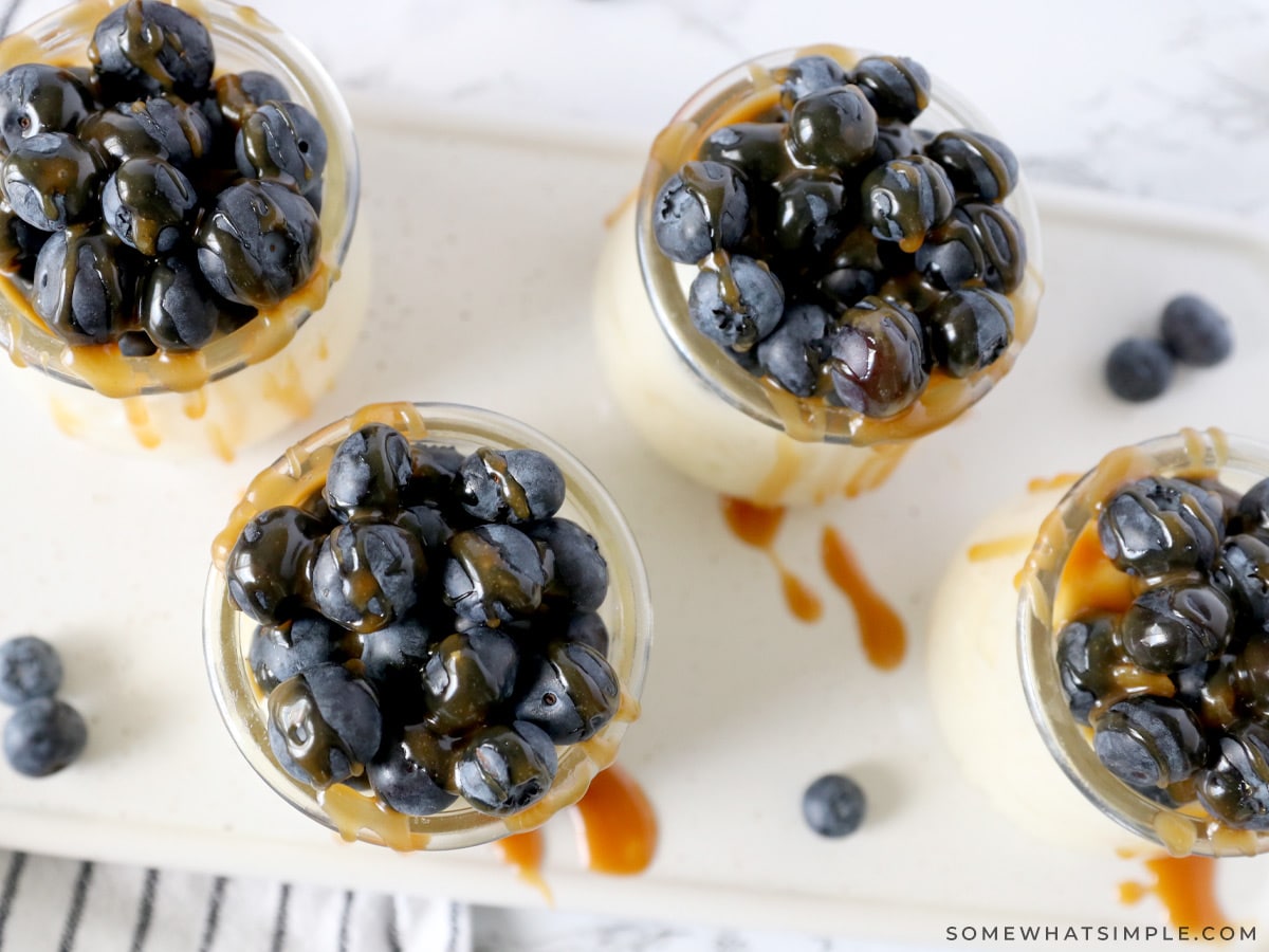 overhead shot of blueberries and salted caramel on rice pudding