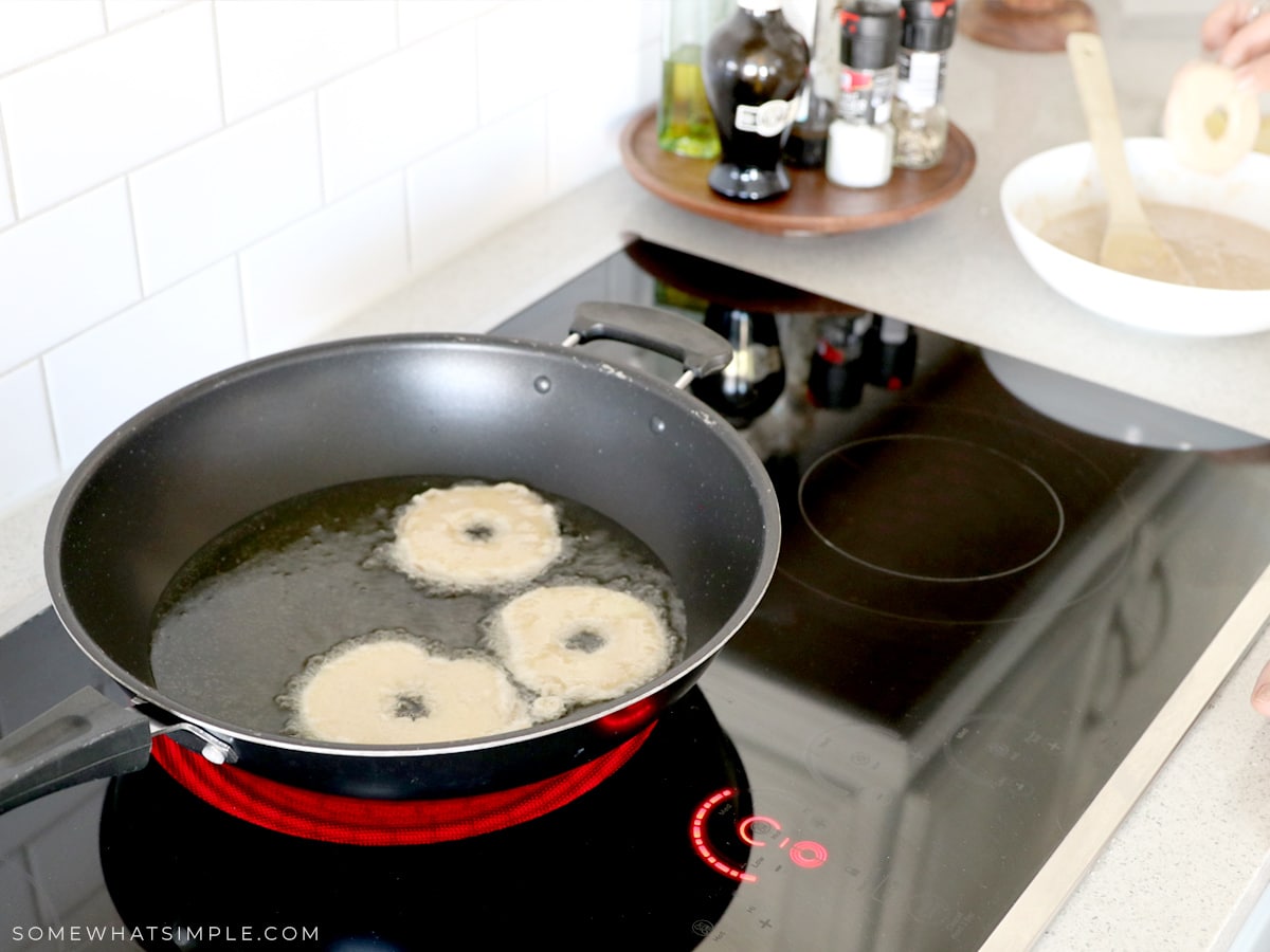 frying apple slices on the stove