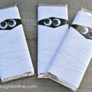 3 mummy candy bars with googly eyes