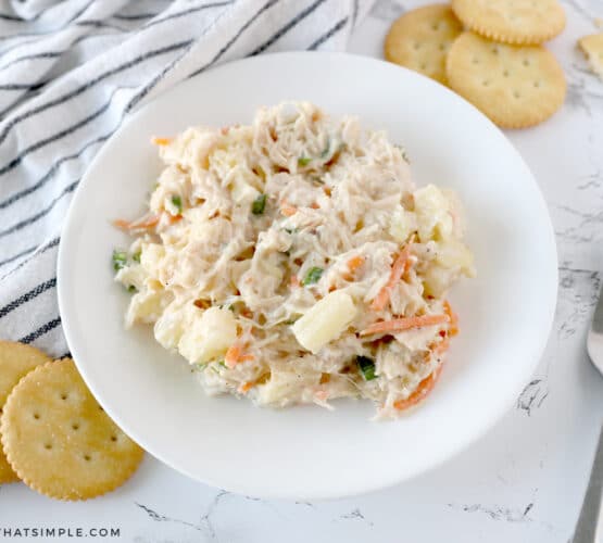 pineapple chicken salad in a white serving bowl