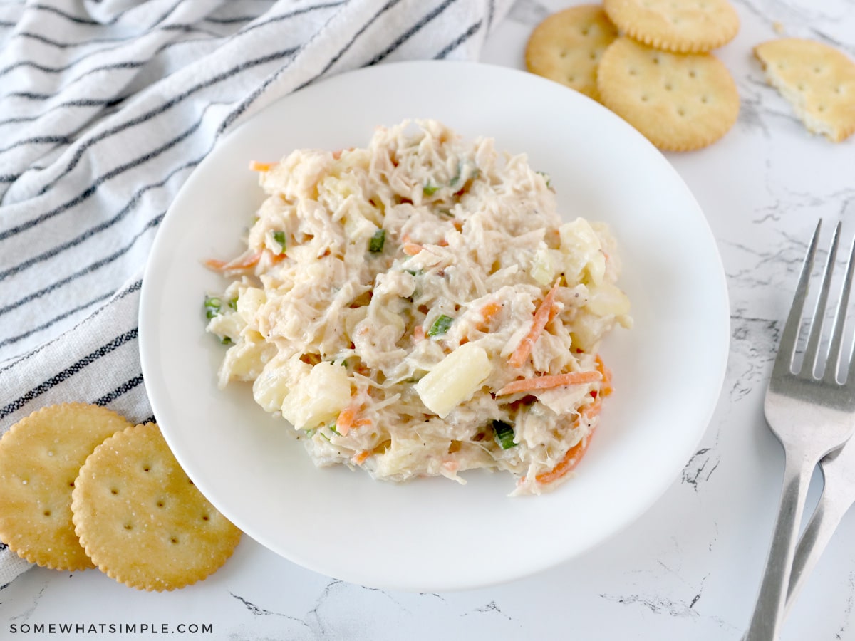 pineapple chicken salad in a white serving bowl