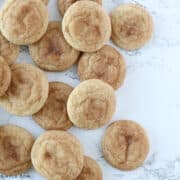 snickerdoodle cookies in a pile on the coutner