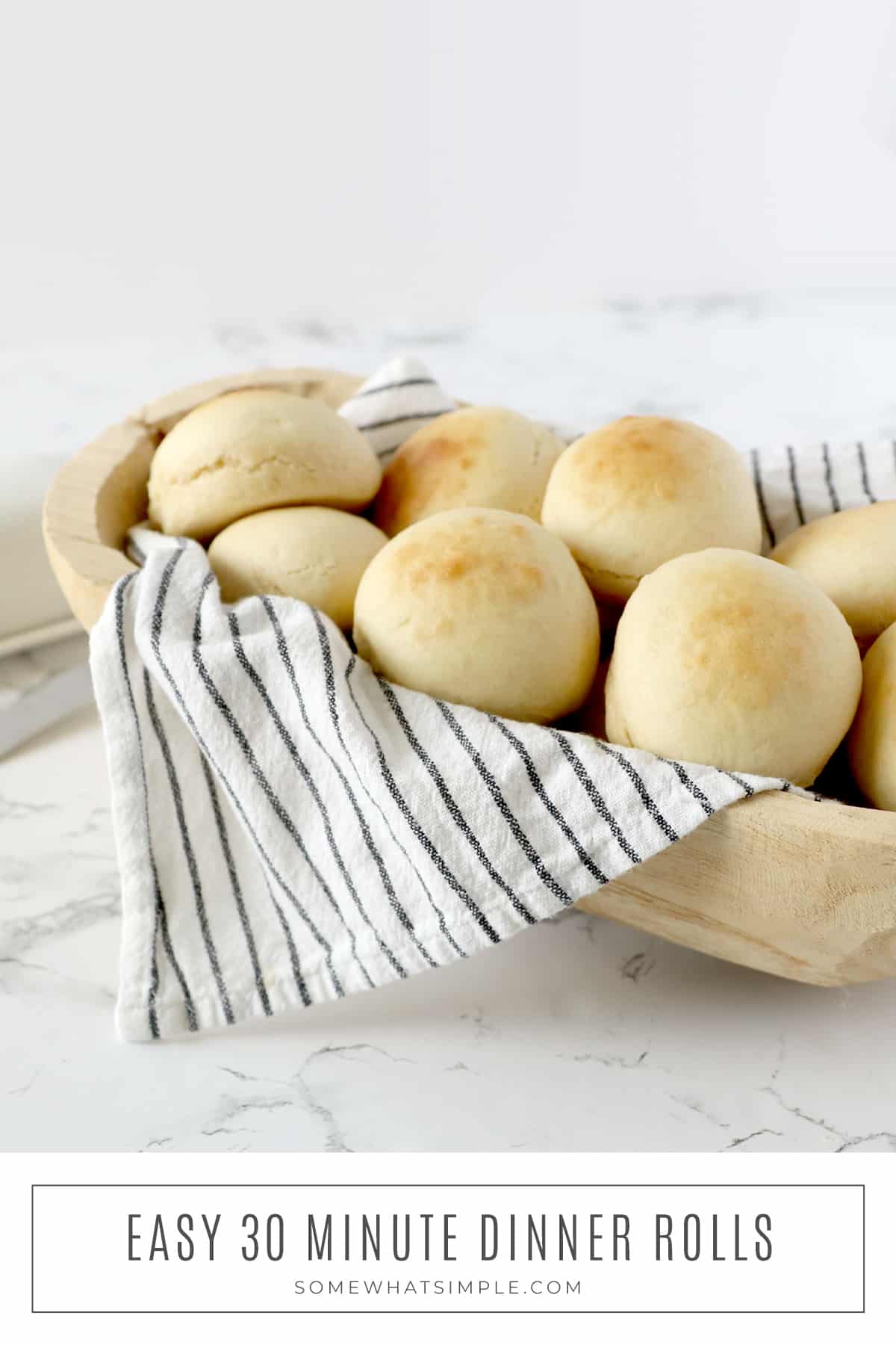 Made from scratch, these quick and easy 30-minute dinner rolls turn out light and fluffy every time, and they taste absolutely amazing! via @somewhatsimple