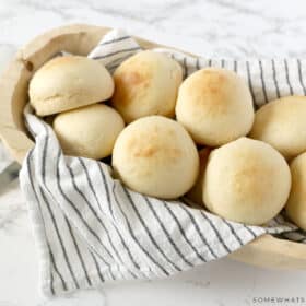 finished dinner rolls in a bread basket