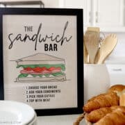 sandwich bar sign in a frame