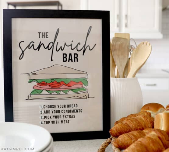 sandwich bar sign in a frame
