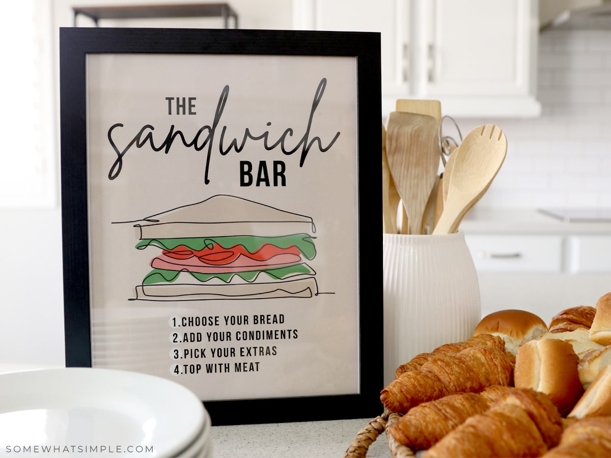 sandwich bar sign in a frame