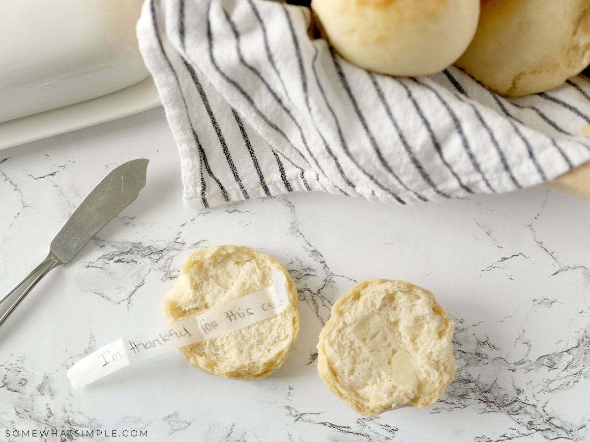 dinner rolls with strips of paper in them