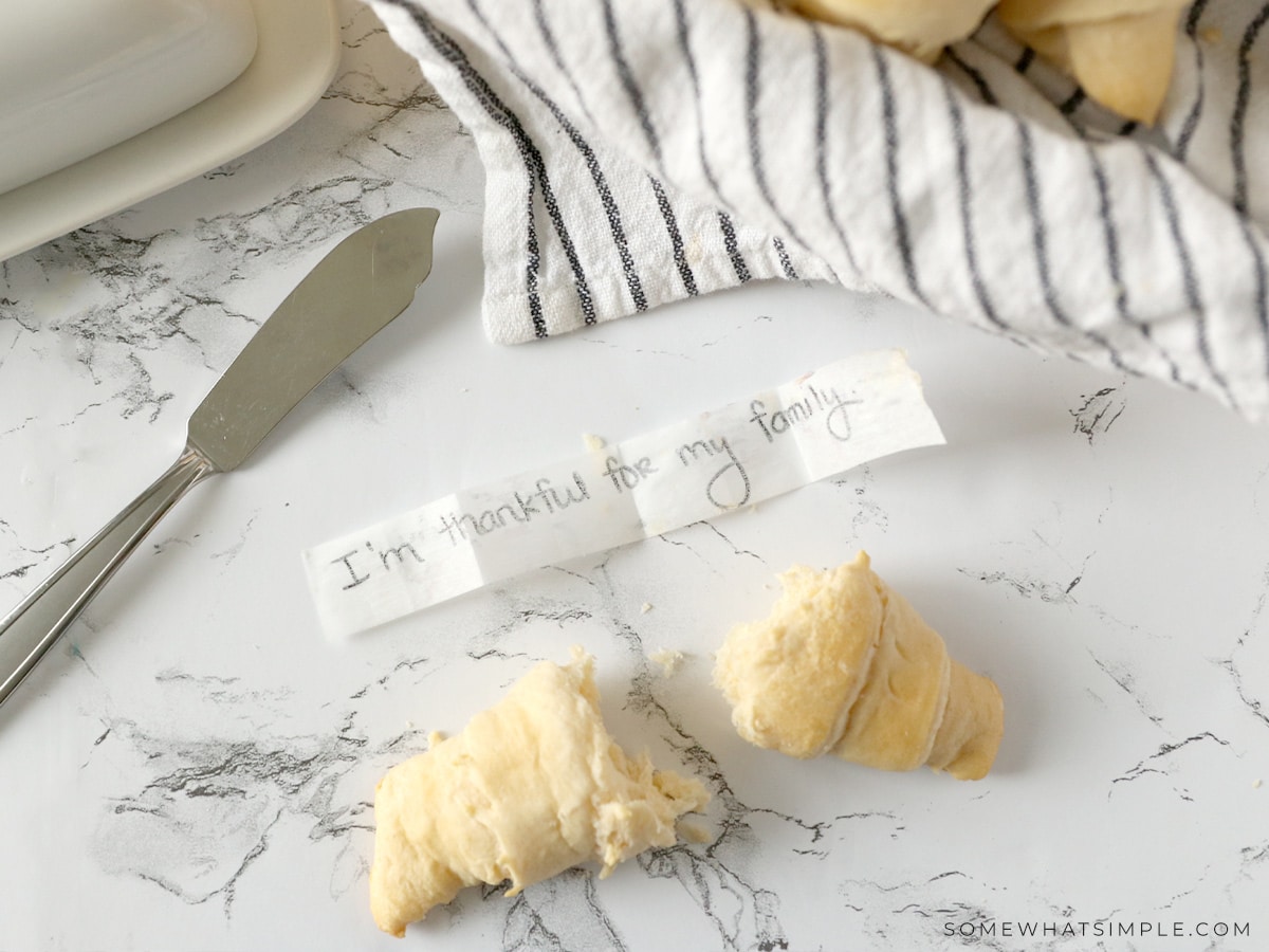 crescent rolls with strips of paper baked into them