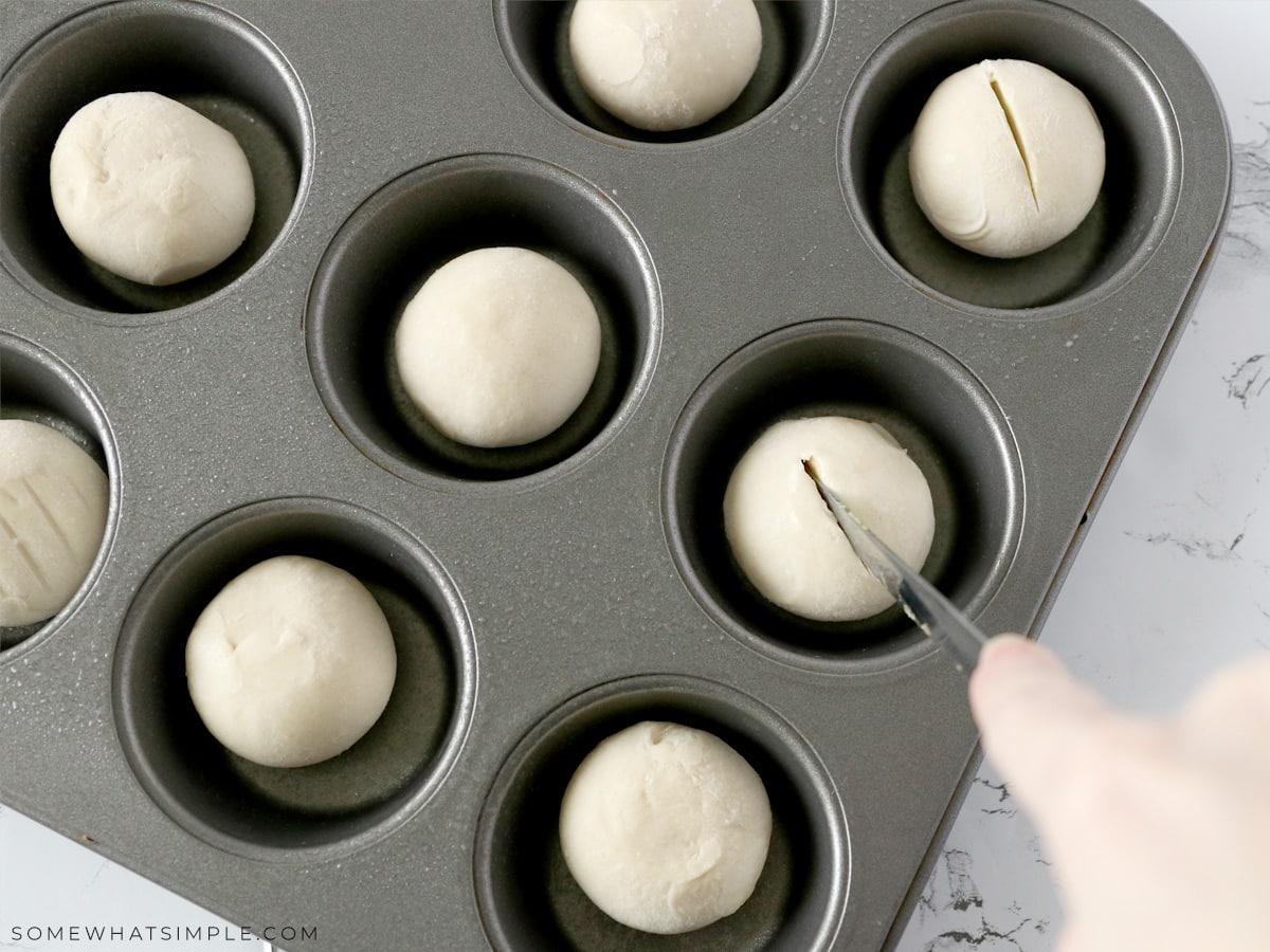 cutting slits into frozen roll dough