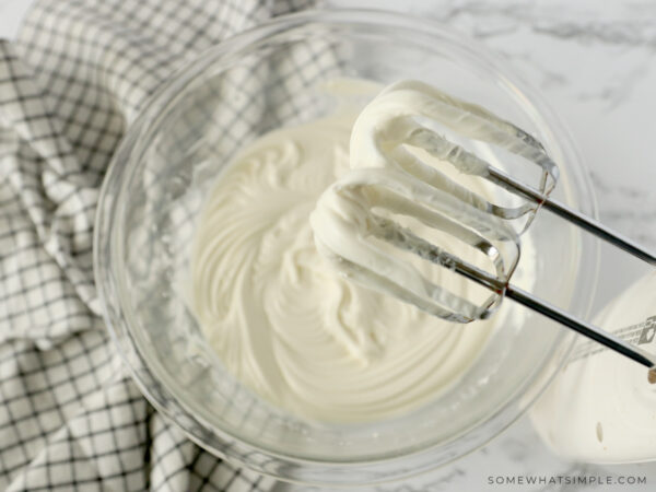 making frosting in a glass bowl