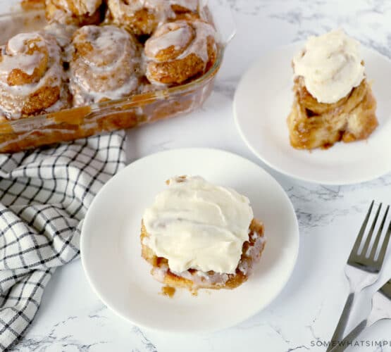 plated 30-minute cinnamon rolls with tray in background