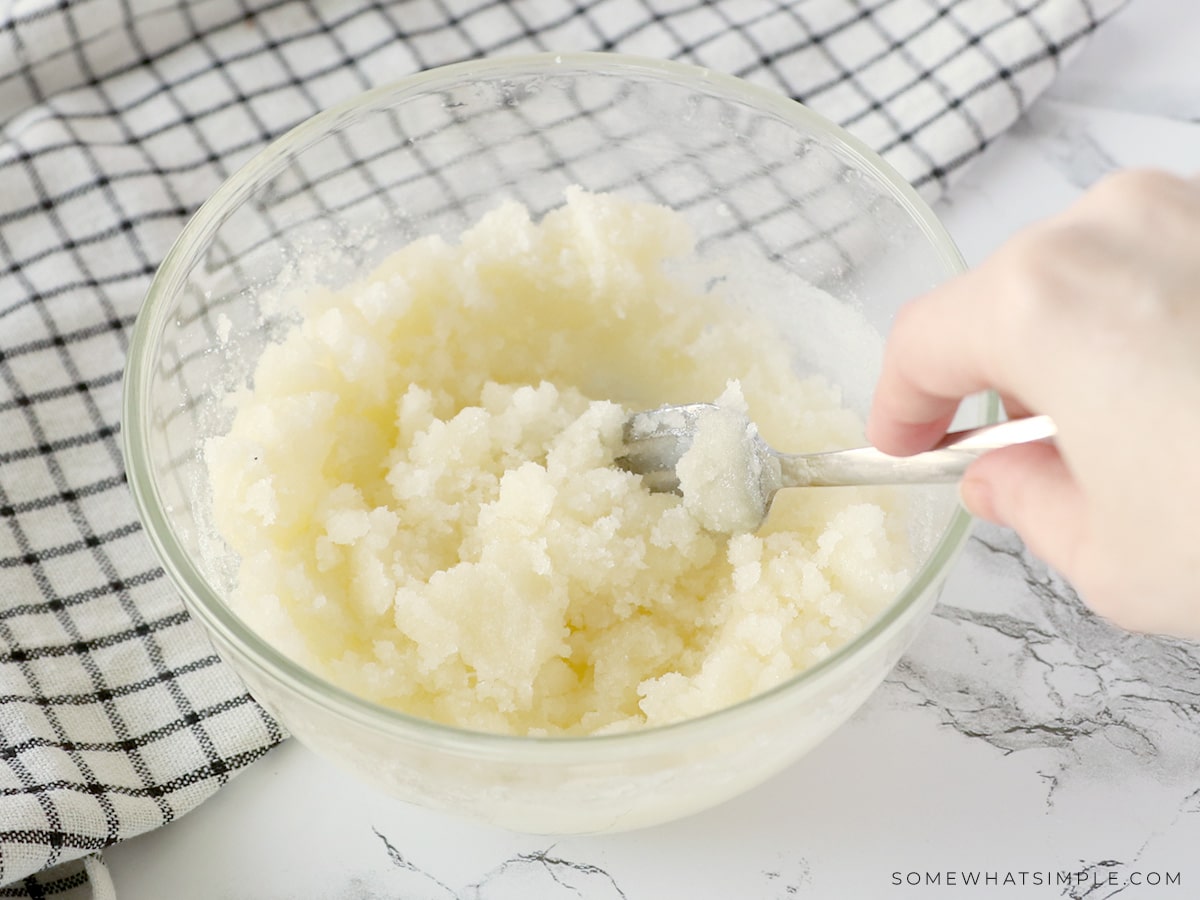 mixing sugars in a bowl