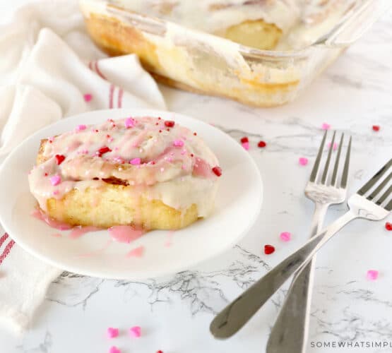 pink frosted cinnamon rolls for Valentines Day