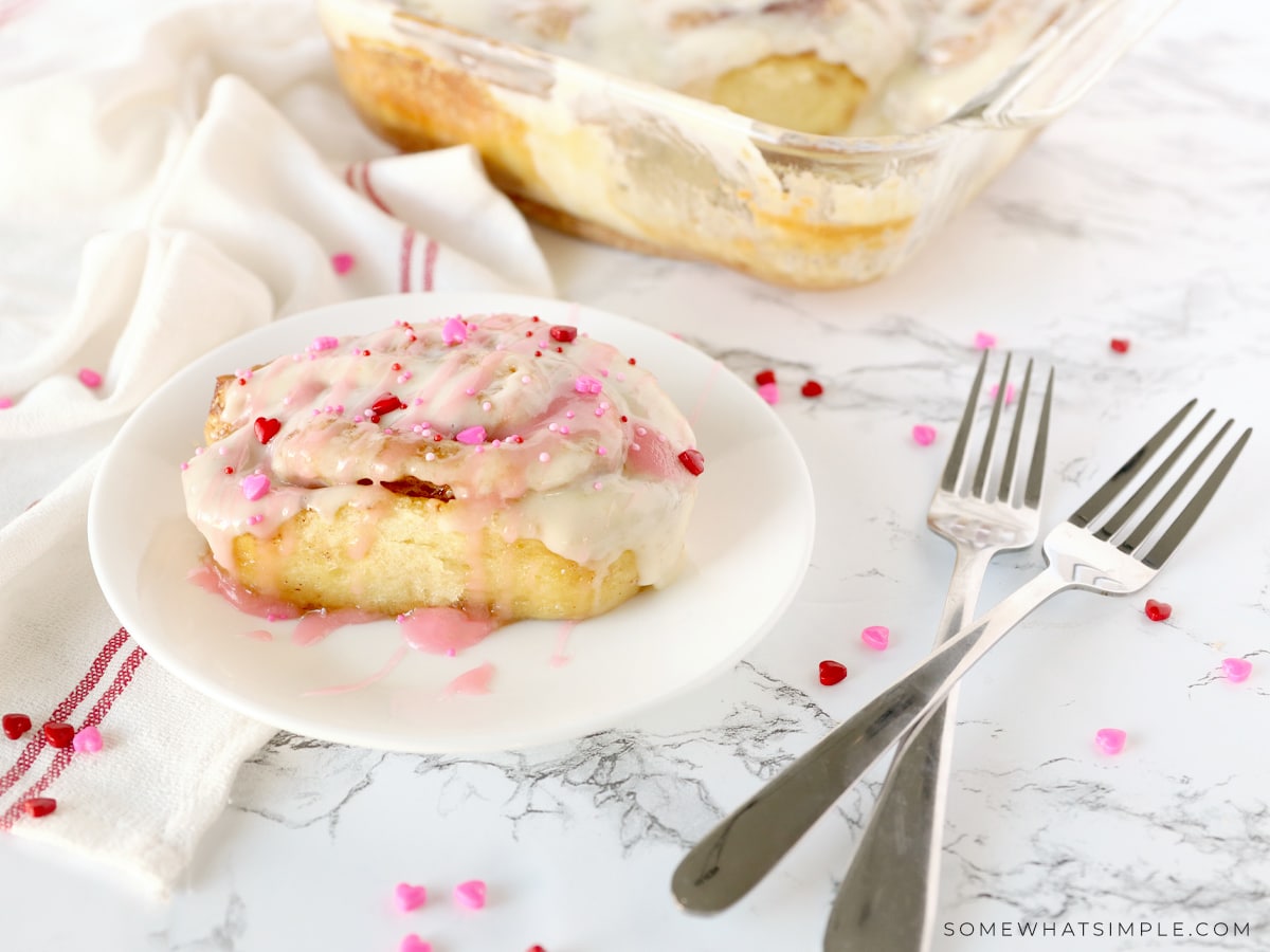 pink frosted cinnamon rolls for Valentines Day