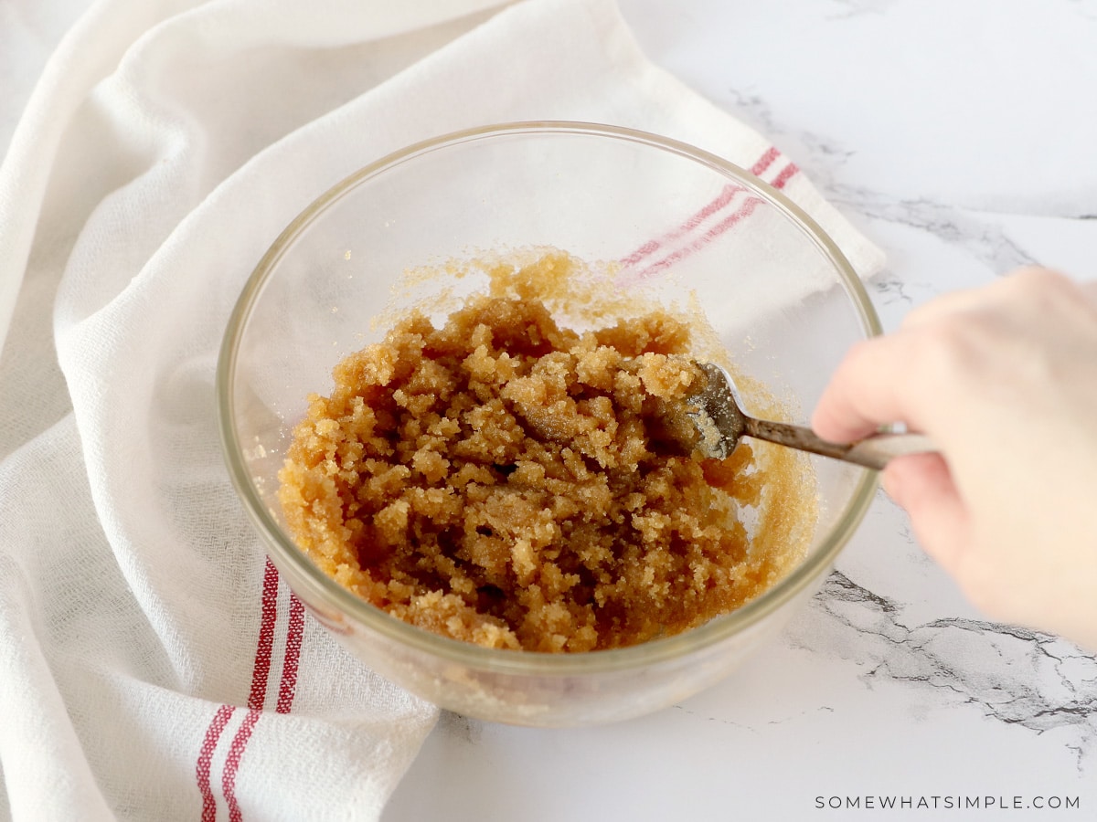 mixing a cinnamon mixture for cinnamon rolls