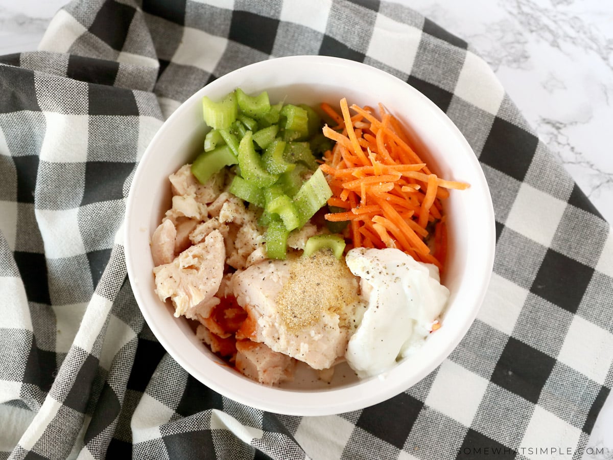 adding all ingredients to a mixing bowl