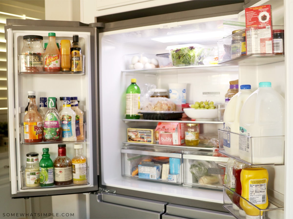 before picture of a cluttered fridge