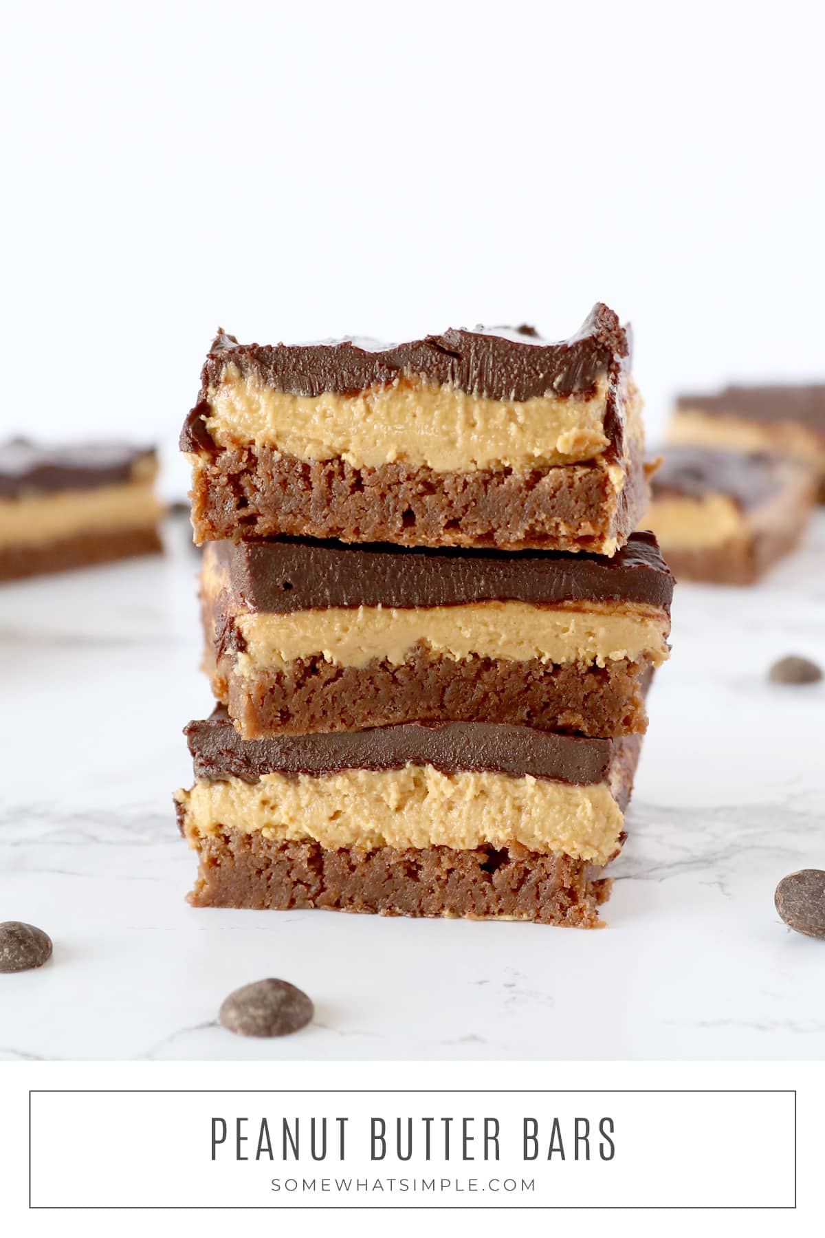 Peanut Butter Bars are a classic dessert that is easy to make! These triple-layered bars have brownies, peanut butter, and a delicious chocolate ganache. via @somewhatsimple