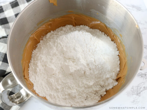 mixing peanut butter and powdered sugar