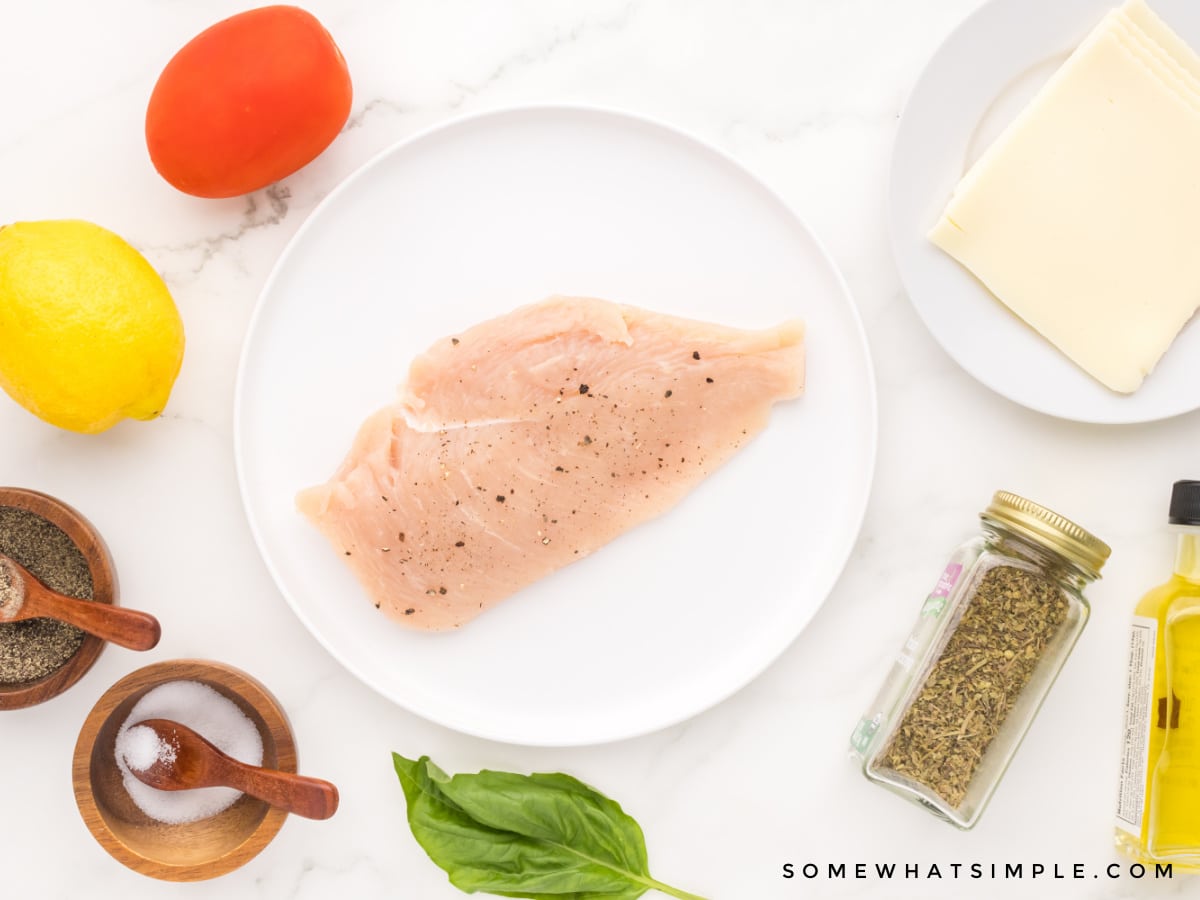 raw chicken and other ingredients used to make bruschetta chicken