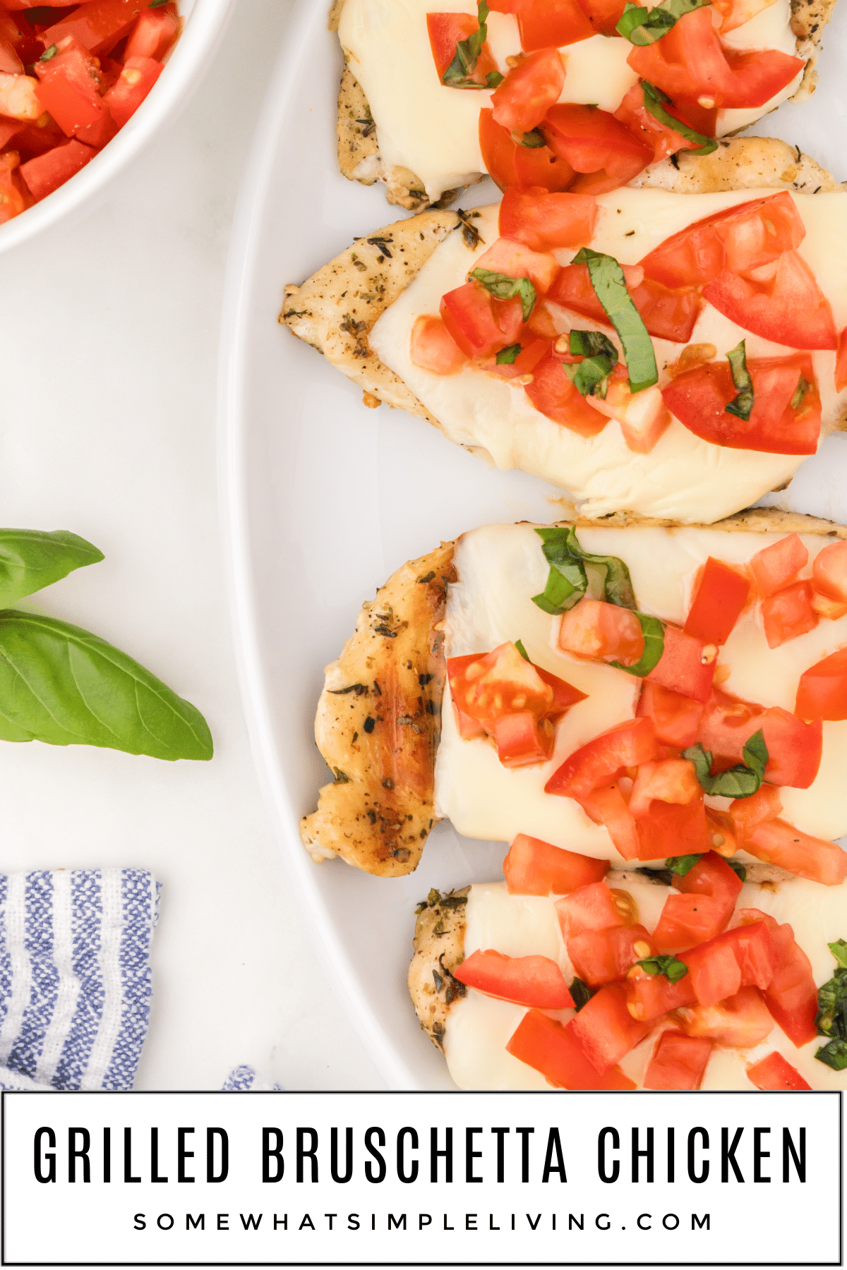 Dust off the grill and elevate your outdoor dining game with a dish that encapsulates the flavors of the season - Grilled Bruschetta Chicken. Make it outside on the grill, or grab your indoor grill and serve it all year long! via @somewhatsimple