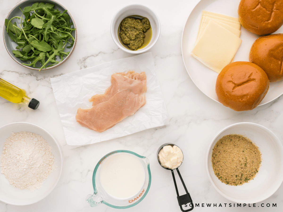 ingredients to make a chicken sandwich laid out on the counter