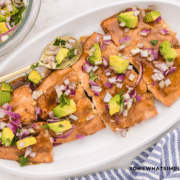 plated grilled salmon with avocado salsa