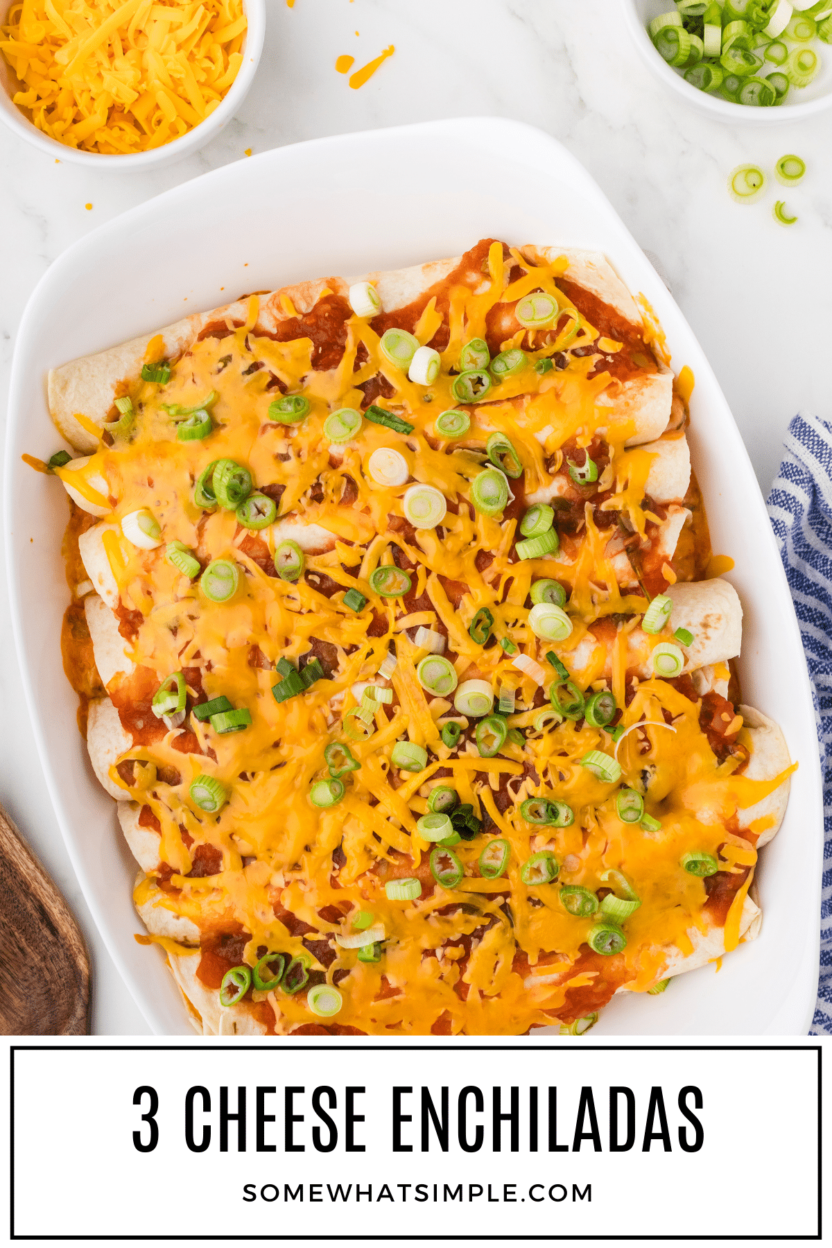 3 Cheese enchiladas are made with zesty salsa and 3 kinds of cheese including cream cheese, cheddar, and Monterey Jack then topped with more salsa and cheese and baked until bubbly! The perfect family-friendly meal that combines comfort and simplicity with pure satisfaction! via @somewhatsimple
