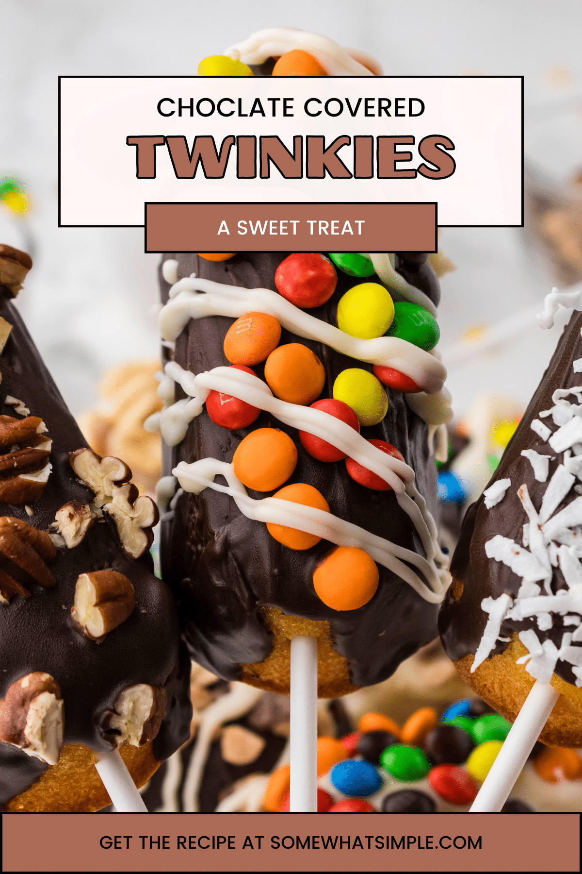 Level up those Twinkies by putting them on a stick and dipping them in chocolate! Chocolate Covered Twinkies are a fun and delicious treat! via @somewhatsimple
