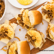 finished product of Hawaiian Pulled Pork Sandwiches on a wood cutting board
