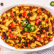 Finished Frito Pie in a white baking dish