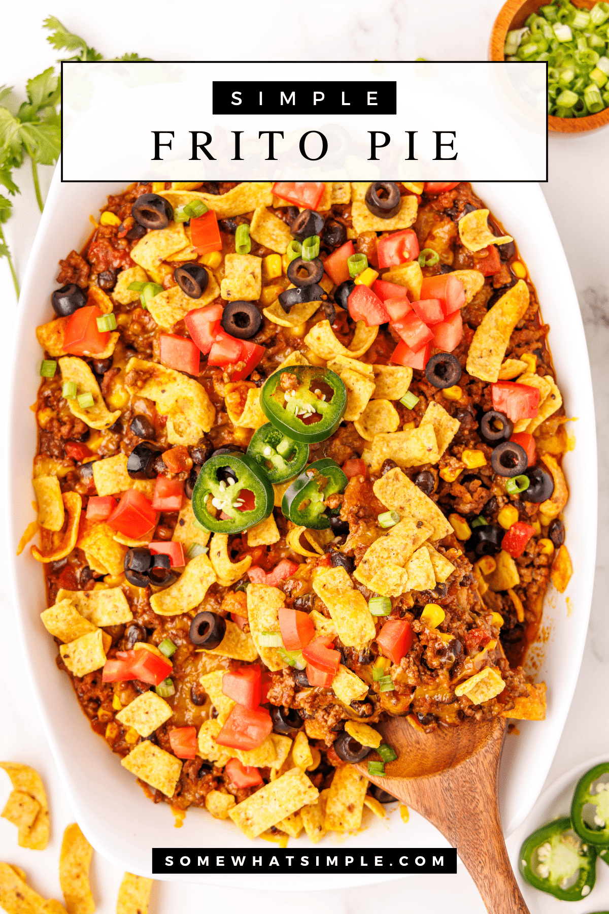This Frito Pie is the ultimate comfort food that’s fast, flavorful, and perfect for any occasion. via @somewhatsimple