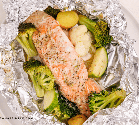 herb butter salmon foil dinner, plated in foil.