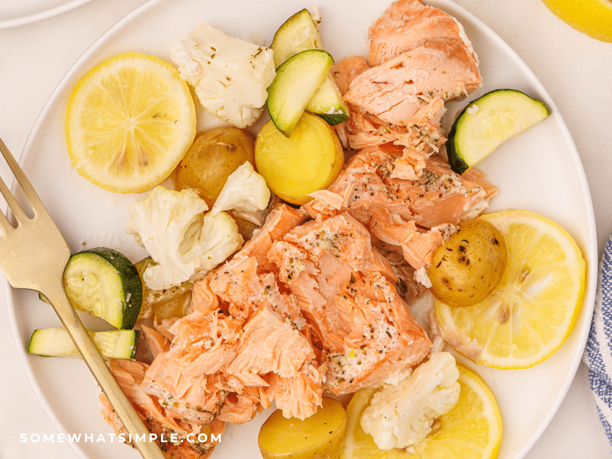 over head shot of plated herb butter salmon foil dinner