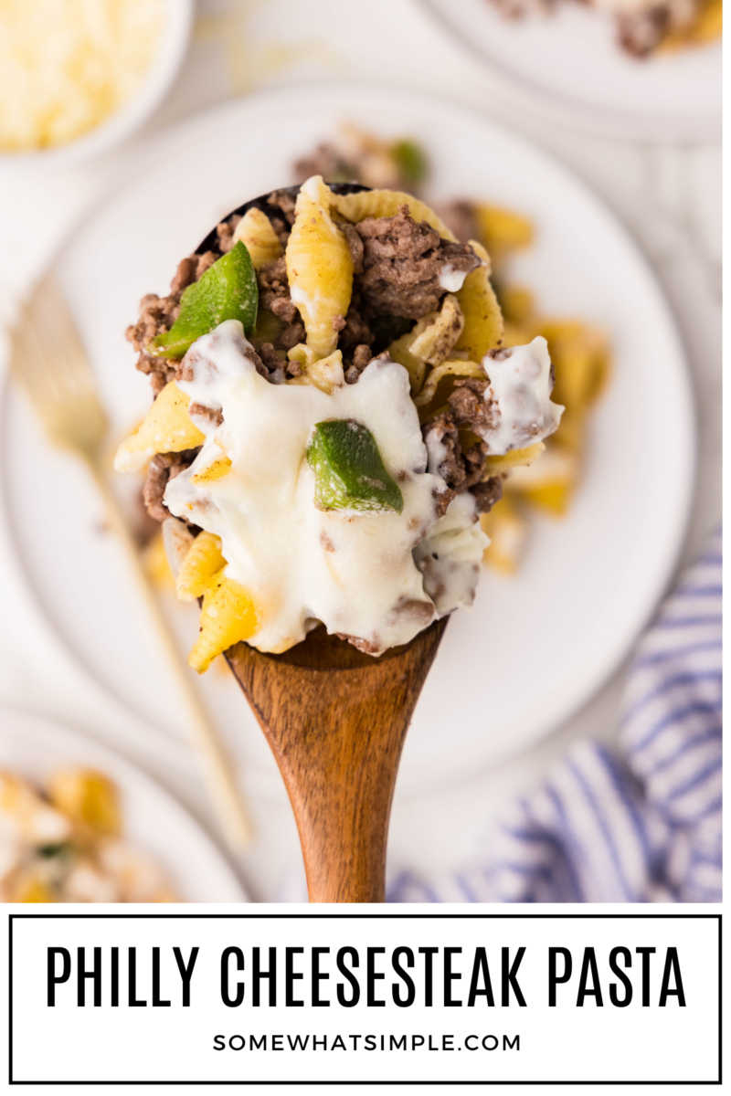 Wood spoon with Philly Cheesesteak Casserole with text overlay