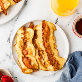 overhead shot of Bacon Pancake Dippers on a white plate