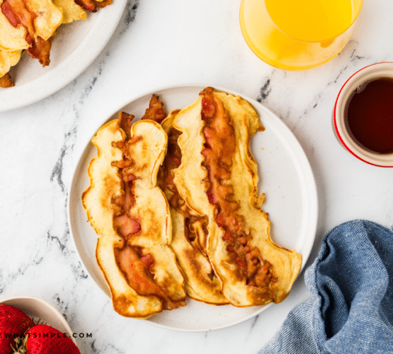 overhead shot of Bacon Pancake Dippers on a white plate