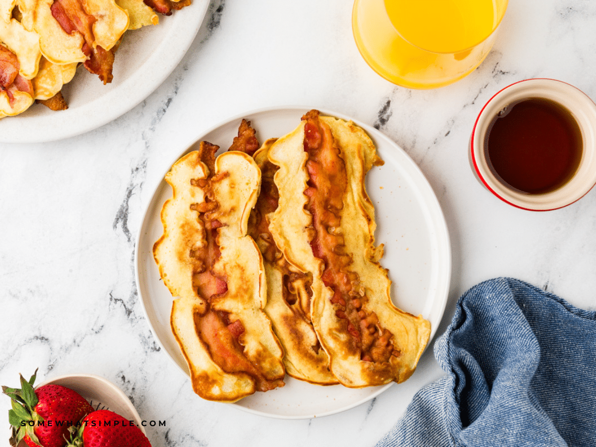 overhead shot of Bacon Pancake Dippers on a white plate