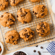 Pumpkin Chocolate Chip Cookies fresh from the oven on a baking sheet