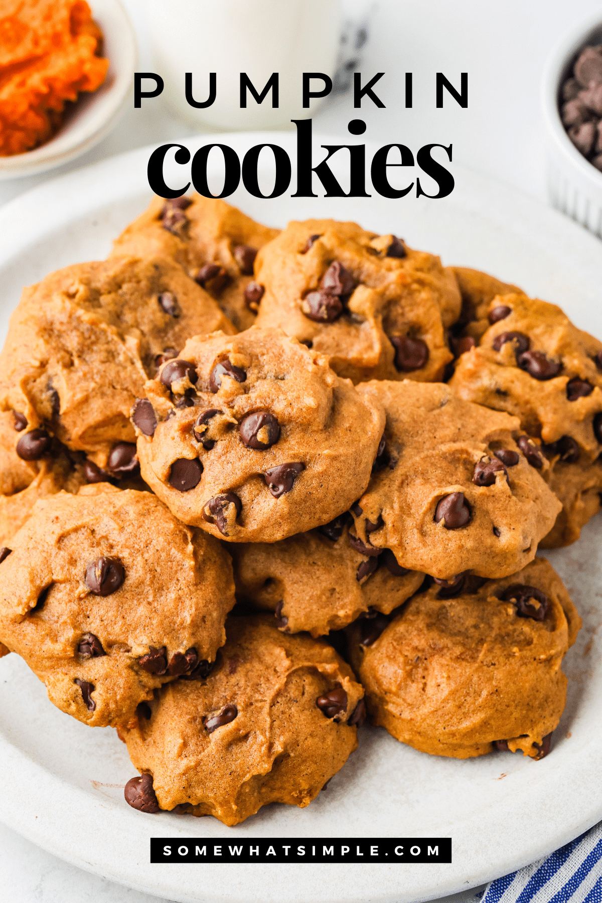 Soft, puffy pumpkin chocolate chip cookies loaded with fall flavor. Eat one (or five) for breakfast—it’s pumpkin season! via @somewhatsimple