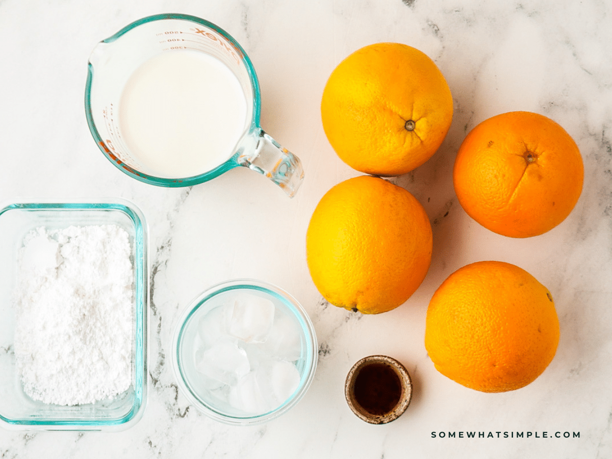 overhead shot of the ingredients used to make orange julius'