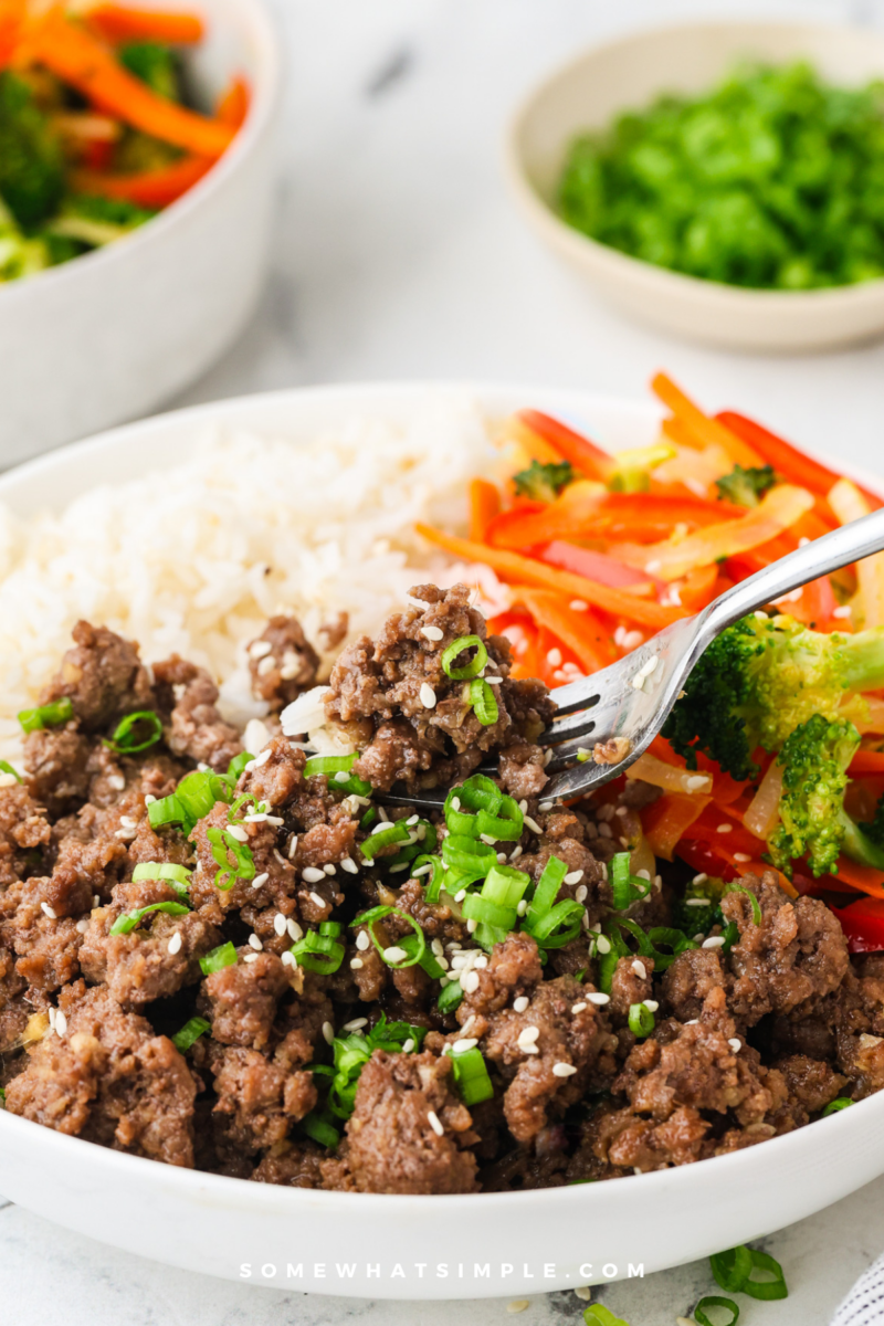 Korean Beef Bowls being dug into with a fork